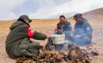 Rangers cook with fire of dry dung during patrol at the Changtang National Nature Reserve in Nyima County of southwest China`s Xizang Autonomous Region, May 10, 2024. (Xinhua/Tenzin Nyida)
