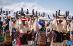 Performers dance at an event celebrating the melting of frozen water of Lake Namtso in southwest China`s Xizang Autonomous Region, May 19, 2024. As temperature rises and ice melts, the Lake Namtso will enter its tourism season. (Xinhua/Tenzin Nyida)