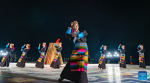 Performers dance at a bonfire party celebrating the melting of frozen water of Lake Namtso in southwest China`s Xizang Autonomous Region, May 18, 2024. As temperature rises and ice melts, the Lake Namtso will enter its tourism season. (Xinhua/Tenzin Nyida)