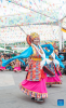 Folk artists stage a Tibetan opera performance near the Potala Palace in Lhasa, southwest China`s Xizang Autonomous Region, June 11, 2024. A five-day Tibetan opera show kicked off here on June 9. (Xinhua/Tenzin Nyida)