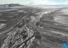 An aerial drone photo taken on June 15, 2024 shows a view of the Tianshui River in the Qiangtang National Nature Reserve in southwest China`s Xizang Autonomous Region. Tianshui River is an important migratory passage for pregnant Tibetan antelopes in the Qiangtang National Nature Reserve. (Xinhua/Jigme Dorje)