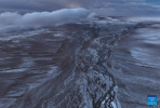 An aerial drone photo taken on June 14, 2024 shows a view of the Tianshui River in the Qiangtang National Nature Reserve in southwest China`s Xizang Autonomous Region. Tianshui River is an important migratory passage for pregnant Tibetan antelopes in the Qiangtang National Nature Reserve. (Xinhua/Purbu Tsering)