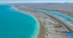 An aerial drone photo taken on June 22, 2024 shows the scenery of Serling Tso Lake in southwest China`s Xizang Autonomous Region.(Xinhua/Tenzin Nyida)