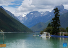 This photo taken on Aug. 2, 2024 shows a view of Basomtso scenic area, a national 5A tourist attraction, in Nyingchi, southwest China`s Xizang Autonomous Region. (Xinhua/Zhang Rufeng)