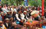 People watch a Tibetan opera performance at Norbulingka in Lhasa, southwest China`s Xizang Autonomous Region, Aug. 8, 2024. Tibetan opera performances are staged here from Aug. 4 to Aug. 10 in celebration of the traditional Shoton Festival, or Yogurt Festival. (Xinhua/Jigme Dorje)