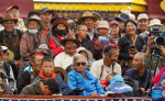 People watch a Tibetan opera performance at Norbulingka in Lhasa, southwest China`s Xizang Autonomous Region, Aug. 8, 2024. Tibetan opera performances are staged here from Aug. 4 to Aug. 10 in celebration of the traditional Shoton Festival, or Yogurt Festival. (Xinhua/Jigme Dorje)