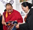 Panchen Erdeni Chos-kyi rGyal-po visits an exhibition themed on rural revitalization in Nagqu City, southwest China`s Xizang Autonomous Region, Aug. 8, 2024. (Photo by Chogo/Xinhua)