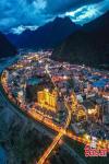 Lights illuminate Nyingchi City along the Nyang River, creating a picturesque night scenery in southwest China`s Xizang Autonomous Region, Aug. 22, 2024. (Photo/China News Service)