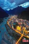 Lights illuminate Nyingchi City along the Nyang River, creating a picturesque night scenery in southwest China`s Xizang Autonomous Region, Aug. 22, 2024. (Photo/China News Service)