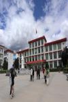 Students walk across the schoolyard after finishing a class at the University of Tibetan Medicine in Lhasa, Xizang autonomous region. [Photo by Palden Nyima/chinadaily.com.cn]