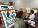 Students learn thangka painting at the Xizang Thangka Painting Institute in Lhasa, capital of the Xizang autonomous region. [Photo by Palden Nyima/chinadaily.com.cn]