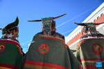 Villagers display folk costume in Kejia Village of Pulan County, southwest China`s Xizang Autonomous Region, Sept. 9, 2024.  Originating in Pulan County, Pulan folk costume has been a traditional garment worn at celebrations for over a millennium. Weighing more than 20 kilograms, a piece of this unique costume is usually decorated with rare metals and jewels, like gold, silver, beeswax, coral and turquoise. (Xinhua/Sun Ruibo)