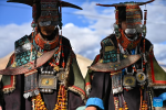 Villagers dressed in folk costume dance in Kejia Village of Pulan County, southwest China`s Xizang Autonomous Region, Sept. 9, 2024.  Originating in Pulan County, Pulan folk costume has been a traditional garment worn at celebrations for over a millennium. Weighing more than 20 kilograms, a piece of this unique costume is usually decorated with rare metals and jewels, like gold, silver, beeswax, coral and turquoise. (Xinhua/Sun Ruibo)